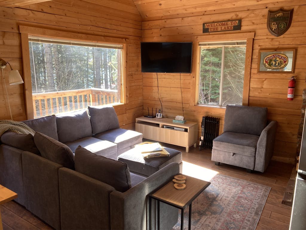 Cozy, dog-friendly cabin w/ a great deck, partial lake views, & beach access