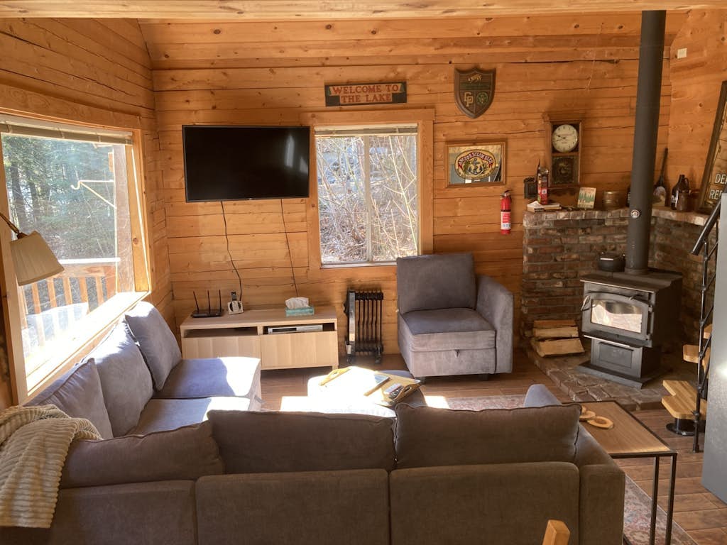 Cozy, dog-friendly cabin w/ a great deck, partial lake views, & beach access