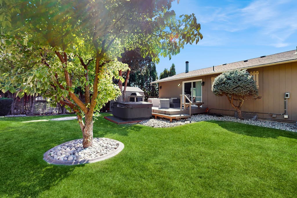 Spacious home w/ game room, private hot tub, mountain views, & bbq grill