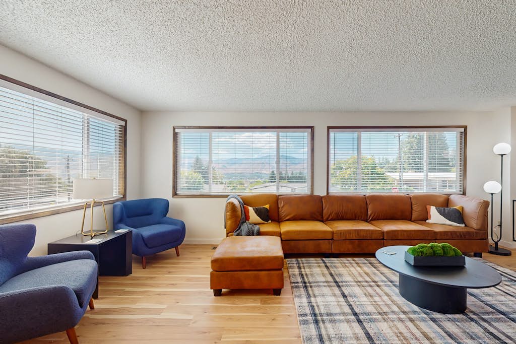 Spacious home w/ game room, private hot tub, mountain views, & bbq grill