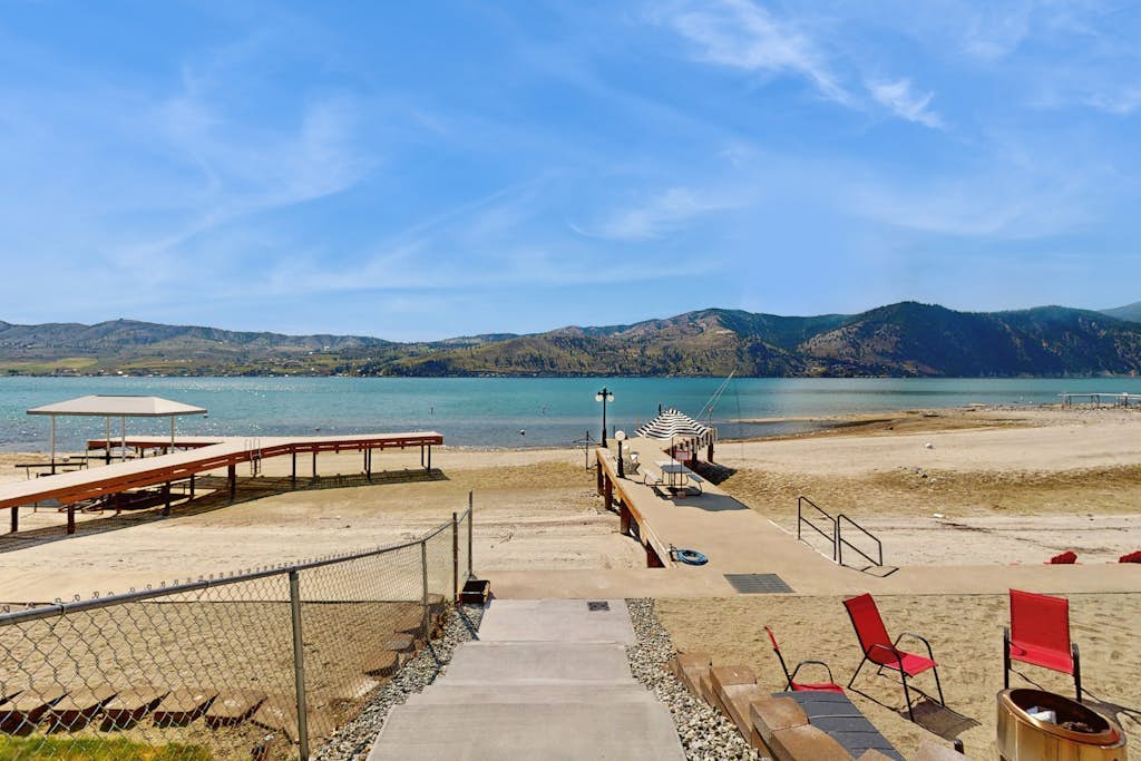 Lakefront home with patio, lake views & shared dock access