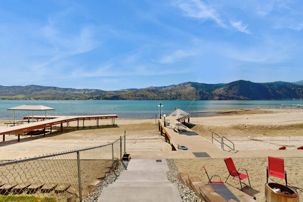 Lakefront home with patio, lake views & shared dock access