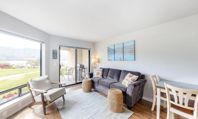 Bright Waterfront Condo with Lake & Mountain Views, Shared Pools & Hot Tubs