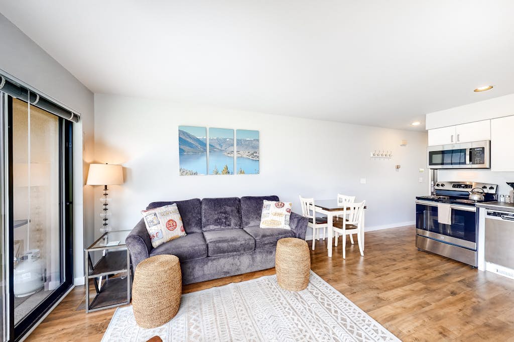 Bright Waterfront Condo with Lake & Mountain Views, Shared Pools & Hot Tubs