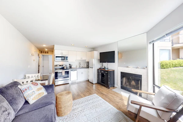 Bright Waterfront Condo with Lake & Mountain Views, Shared Pools & Hot Tubs