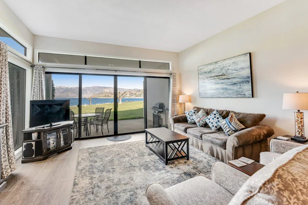 Comfy Lakefront Condo with Water Views, Shared Pool & Hot Tub