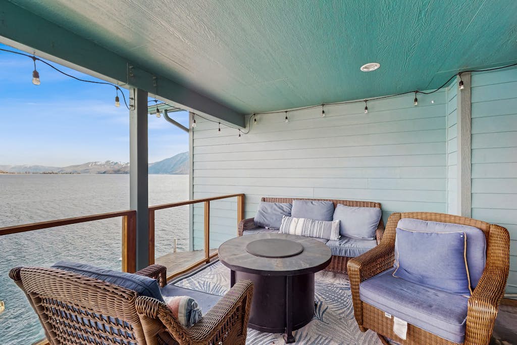 Lakefront home with private hot tub, dock, kayaks, covered veranda & huge views