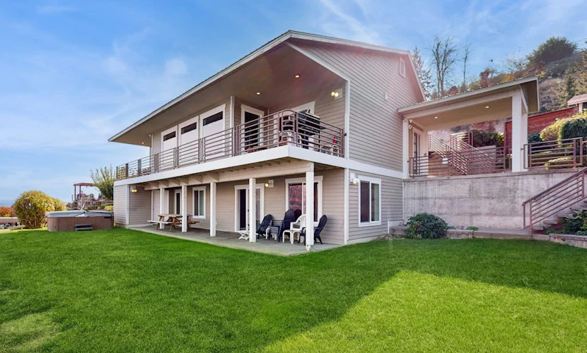 Gorgeous home with 92 feet of private waterfront, swim deck & private hot tub