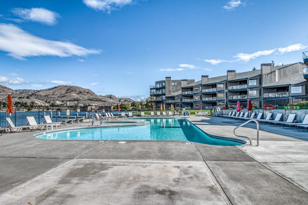 Ideal lakefront condo w/ shared pool/hot tub, shared dock, & high-speed WiFi