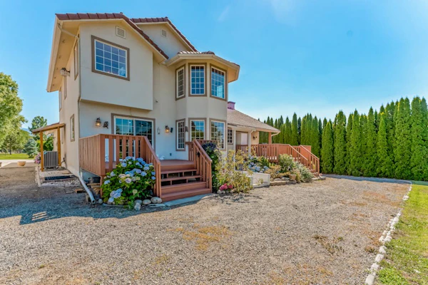Expansive Spanish-style home with two decks, grill, private W/D, & fast WiFi