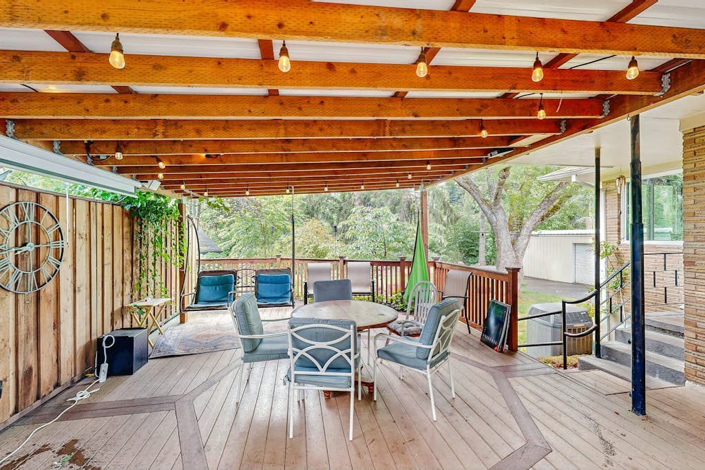 Dog-friendly home on 1/2 acre with creek access, game room & 2 fireplaces