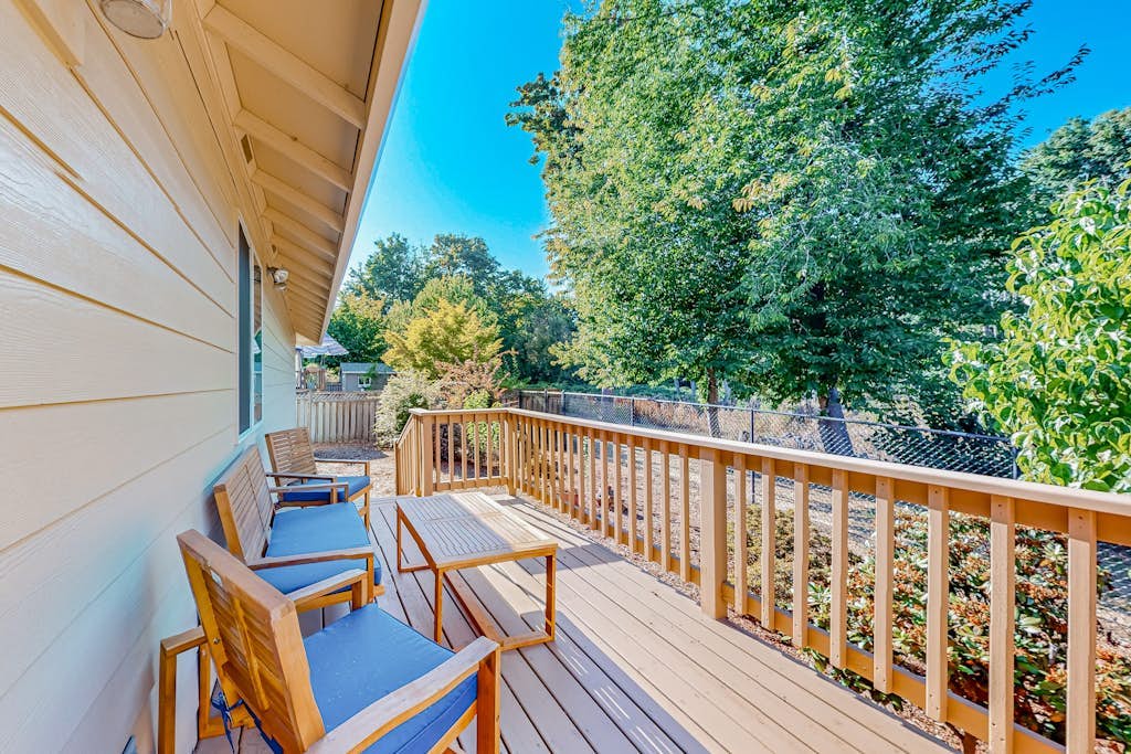 Custom-built home alongside greenspace with deck & massage chairs