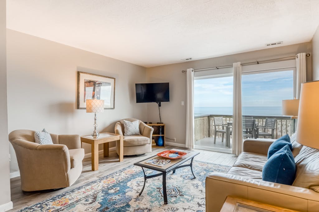 Oceanfront gem with spacious deck, direct beach access, & high-speed WiFi