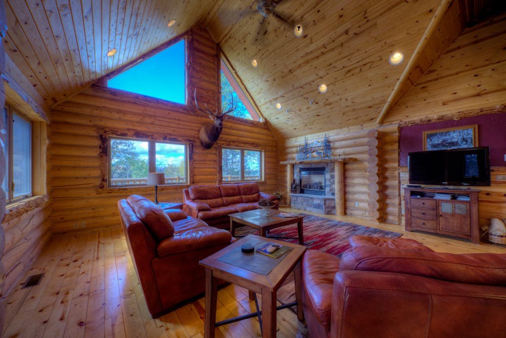 Custom log lodge with private hot tub, gorgeous decks, game room & fireplaces