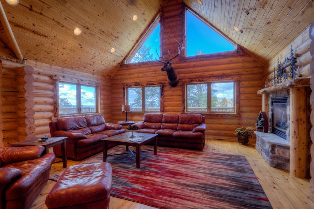 Custom log lodge with private hot tub, gorgeous decks, game room & fireplaces