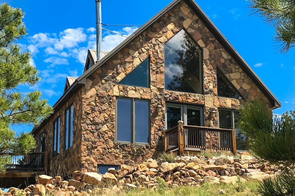 Secluded home on 5 acres with great mountain views, decks, wood stove & W/D