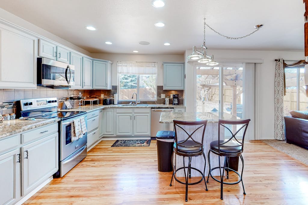 Spacious dog-friendly home with huge fenced yard, grill, & W/D - great location