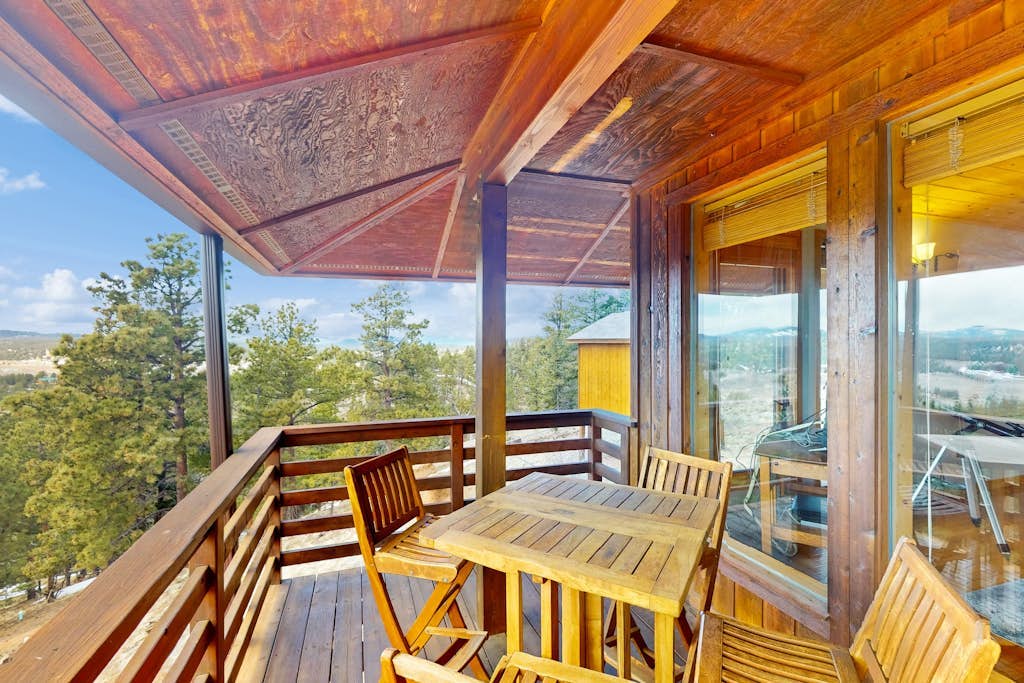 Secluded mountain-view home with expansive deck, hot tub, deck, & grill