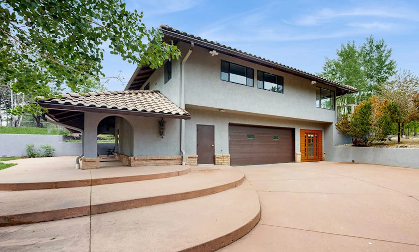 Spacious home with indoor heated pool, volley ball court, and is dog-friendly