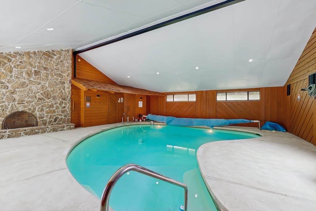 Spacious home with indoor heated pool, volley ball court, and is dog-friendly