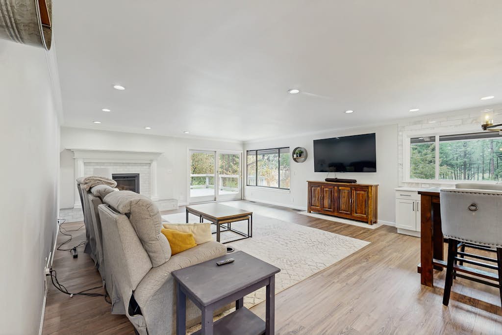 Spacious home with indoor heated pool, volley ball court, and is dog-friendly