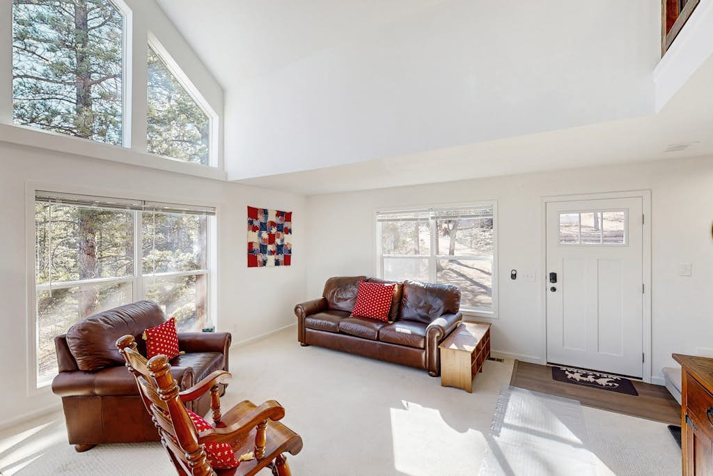 Rural Wood Cabin Surrounded by Trees with WiFi, W/D, & Gorgeous Deck
