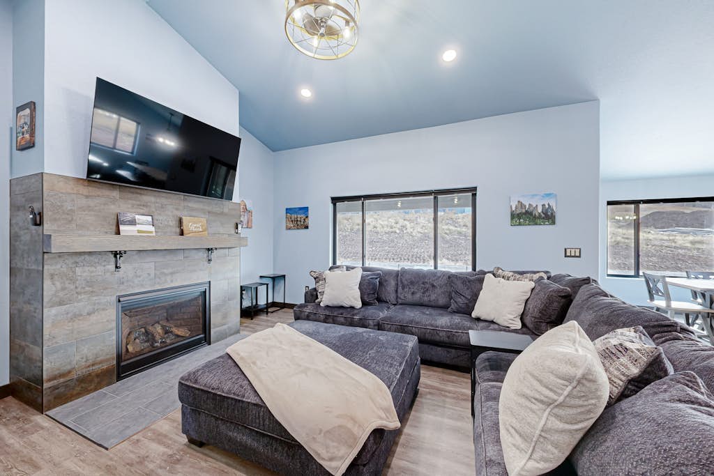 Spacious mountain view home with gas fireplace, game room & heated 4 car garage