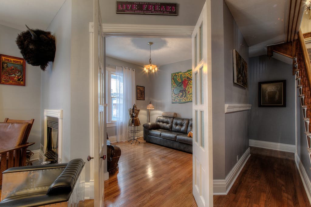 Historical home right in town with tons of character, fireplace & great deck