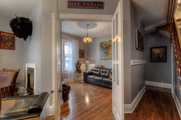 Historical home right in town with tons of character, fireplace & great deck
