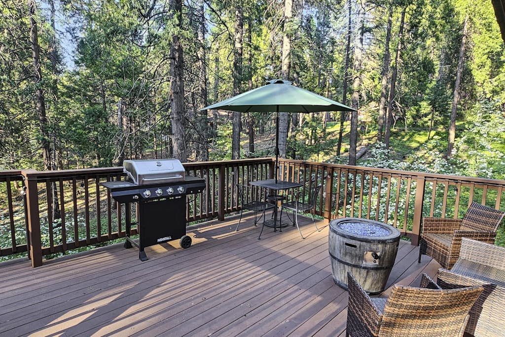 Private dog-friendly cabin with pool access, mtn views, & deck - near skiing