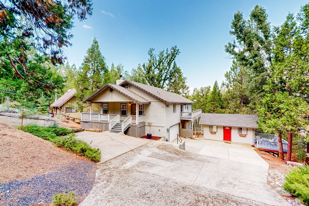 Secluded retreat with pool, nature views, patio, fireplace, & close to lake