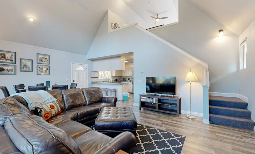 Serene home with spacious deck, fireplace, loft, nearby amenities, dog friendly