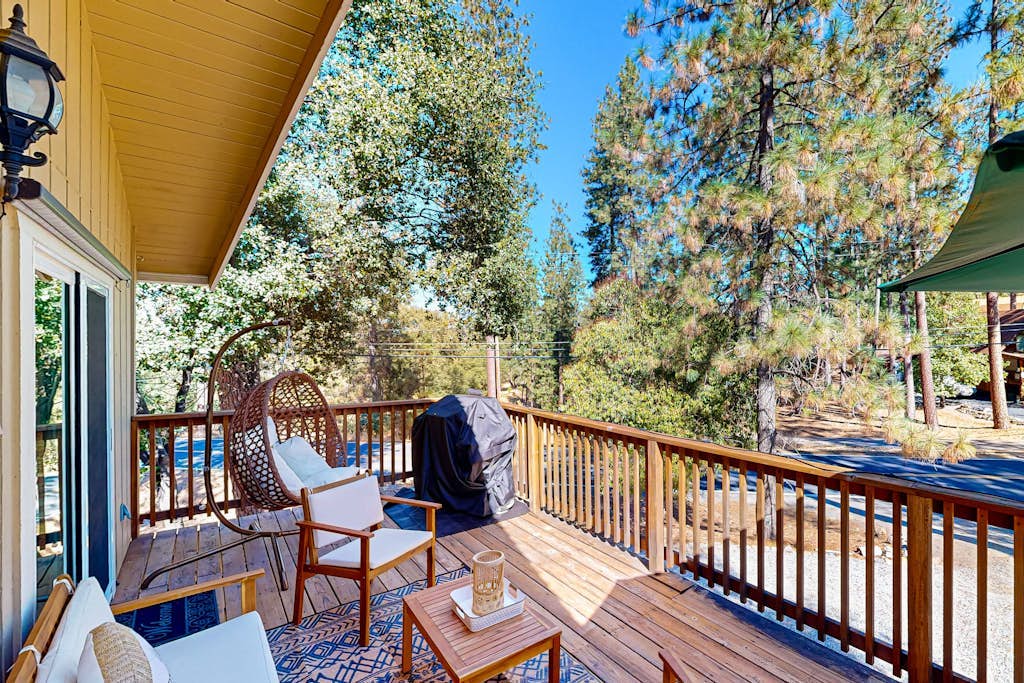 Beautiful home with wraparound deck, fireplace, and pool access