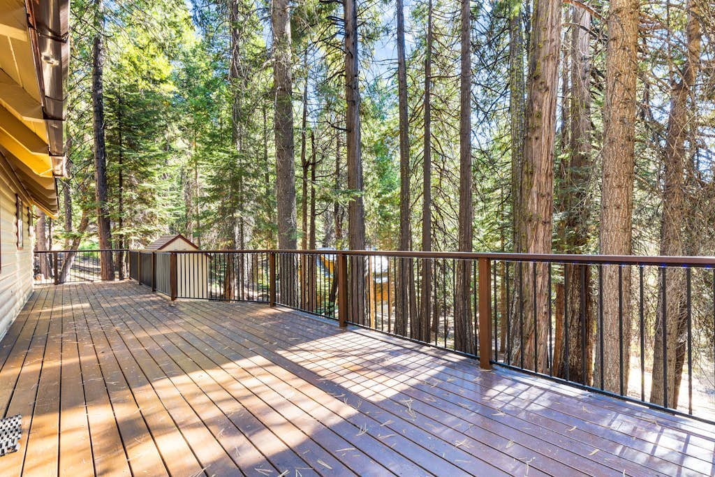Rustic retreat with stunning mountain views - deck, WiFi, woodstove, & W/D