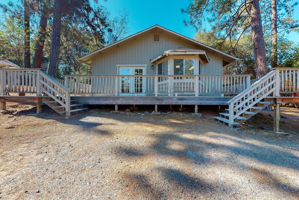 Lovely home away w/ wraparound deck, gas grill, full kitchen, & stylish decor
