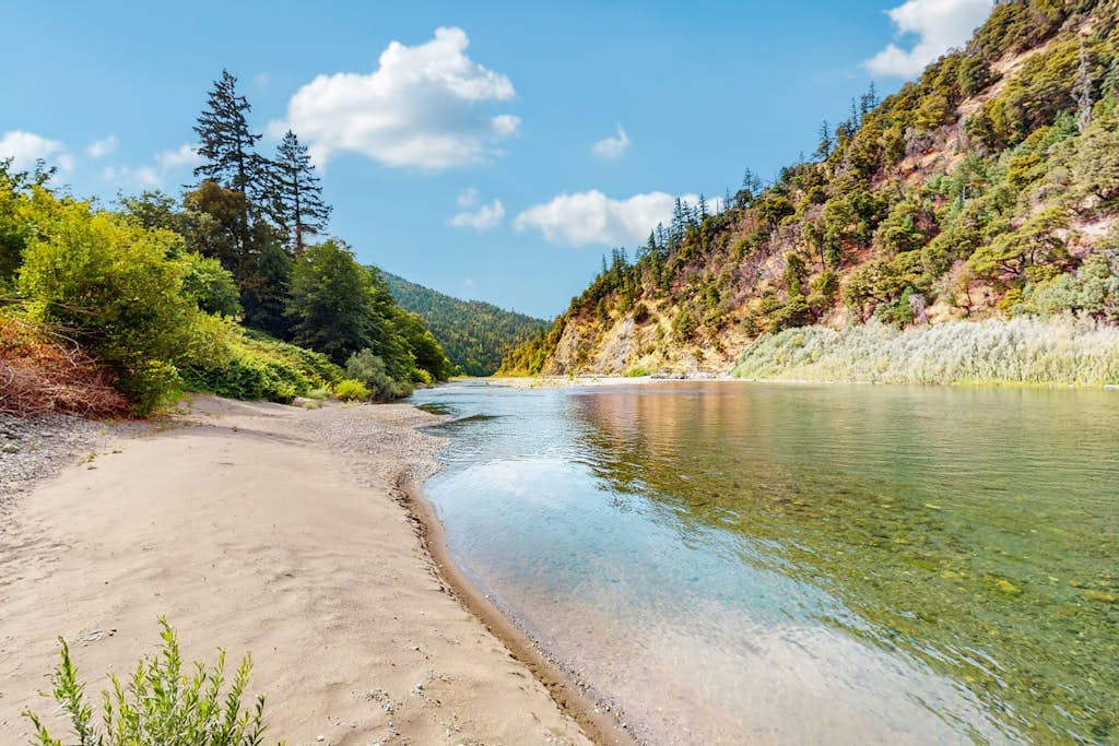 Tranquil riverfront getaway, private pool, seasonal fruit trees, & fishing