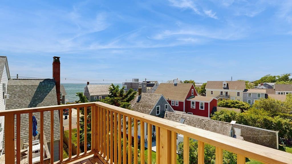 Welcome to White Dory Beach Retreat, a charming one-bedroom, one-and-a-half-bath condominium nestled in Provincetown's sought-after East End. Set within the historic White Dory, this beautifully appointed retreat offers the perfect blend of coastal charm, modern comfort, and an unbeatable location. Spend your days exploring Provincetown's vibrant shops, galleries, and restaurants before returning to your peaceful waterfront escape.

Wake each morning to beautiful bay views from your private deck, where you can sip your coffee as the sun rises over the harbor or unwind with a glass of wine after a day at the beach. Just steps across Commercial Street, the White Dory's private beach invites you to swim, kayak, paddleboard, stroll along the shoreline, or simply soak in Provincetown's spectacular sunsets. Long cherished for its private beach access and tranquil East End setting, the White Dory offers a quintessential Cape Cod experience just moments from the heart of town.

Designed for two guests, the thoughtfully furnished condo features a spacious bedroom with a queen-size bed, one full bath and an additional half bath, a fully equipped kitchen, comfortable living and dining areas, high-speed Wi-Fi, air conditioning, dedicated off-street parking, and beautifully maintained grounds. You'll also enjoy the convenience of being within walking distance of Provincetown's renowned art galleries, cafés, boutique shopping, whale watching excursions, the Pilgrim Monument, and the lively energy of Commercial Street while still enjoying the serenity of the East End.

Whether you're planning a romantic getaway, a relaxing week by the water, or a quintessential Cape Cod escape, White Dory Beach Retreat offers everything you need for an unforgettable stay—private beach access, bay views, modern comforts, and one of Provincetown's most coveted locations.