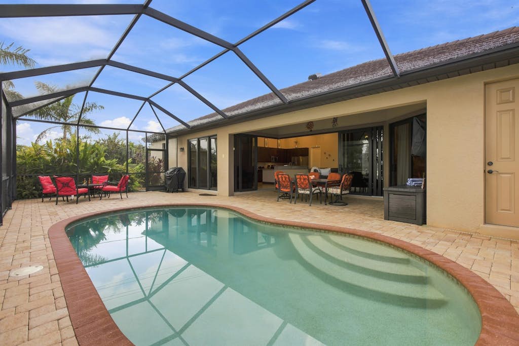 Welcome to your perfect Cape Coral waterfront escape! This beautiful four-bedroom home offers everything you need for a relaxing Southwest Florida vacation. Nestled along a peaceful waterfront setting, the property combines comfort, privacy, and outdoor living, making it an ideal retreat for families, couples, and friends.

Spend your days soaking up the Florida sunshine by the private pool, enjoying the tranquil water views, or unwinding on the lanai with your morning coffee or evening cocktail. This pet-friendly home allows your four-legged family members to join in on the vacation, so everyone can enjoy a memorable getaway together.

Inside, you'll find spacious and inviting living areas designed for comfort, along with a fully equipped kitchen that's perfect for preparing everything from quick breakfasts to family dinners. The open layout provides plenty of room to relax after a day of exploring Cape Coral and the surrounding area.

Conveniently located near local restaurants, shopping, golf courses, parks, and the area's beautiful beaches, this home offers the perfect balance of peaceful waterfront living and easy access to Southwest Florida's top attractions. Whether you're fishing from the backyard, lounging by the pool, or discovering all that Cape Coral has to offer, this waterfront retreat is the perfect place to create lasting vacation memories.
