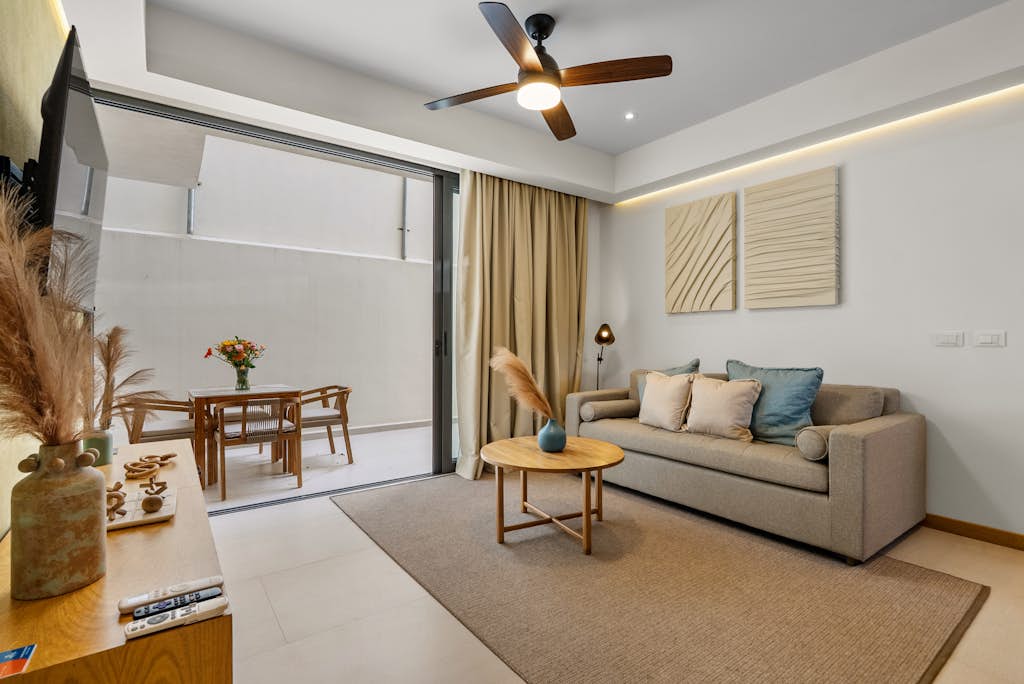 New Home 1BR condo in La Cruz with AC, pool, WiFi, balcony, and full kitchen.