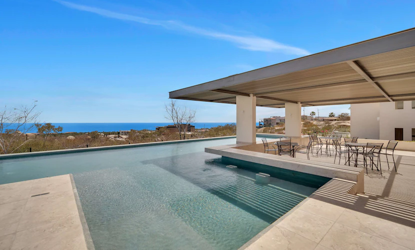 Enjoy this two-bedroom condo, thoughtfully designed with amazing ocean views
• One King bed, and two single beds
• Community Pool with ocean views and sun loungers
• Private balcony with outdoor furniture
• Business center
• Fitness center
• Fifteen minutes driving to Cabo San Lucas downtown
• Convenience stores nearby
• Pickle Ball courts nearby (not included)
• Fully equipped kitchen, smart TV, and AC
• 24/7 security and controlled access