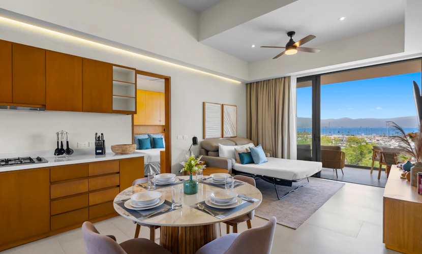 2BR/2BA Alik A12 in La Cruz with pool, gym, AC, WiFi, and balcony.
