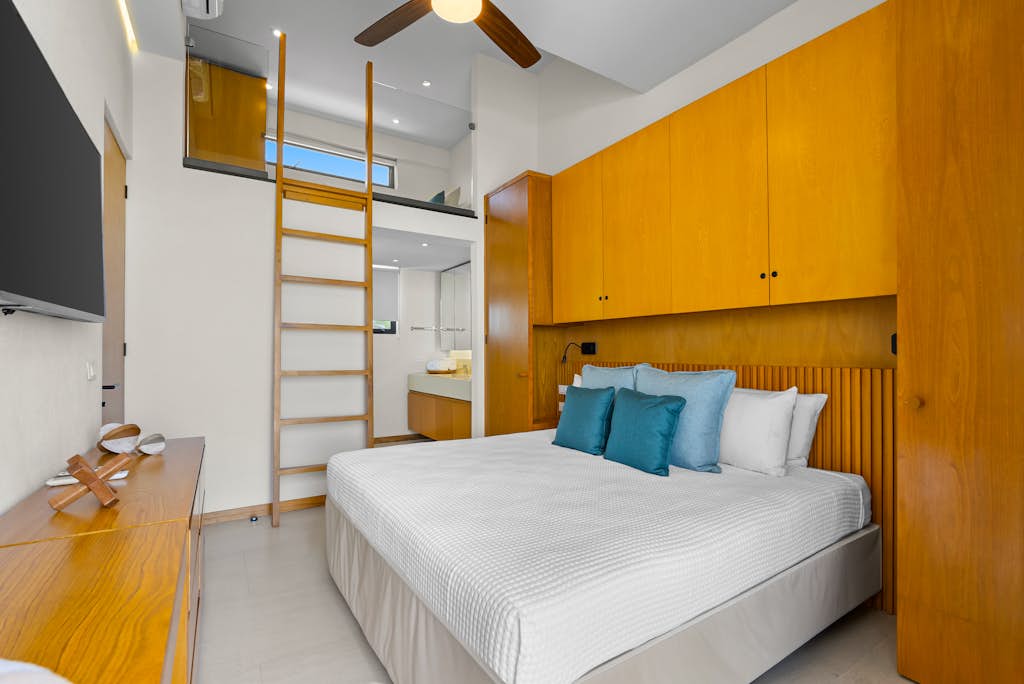 2BR/2BA Alik A12 in La Cruz with pool, gym, AC, WiFi, and balcony.